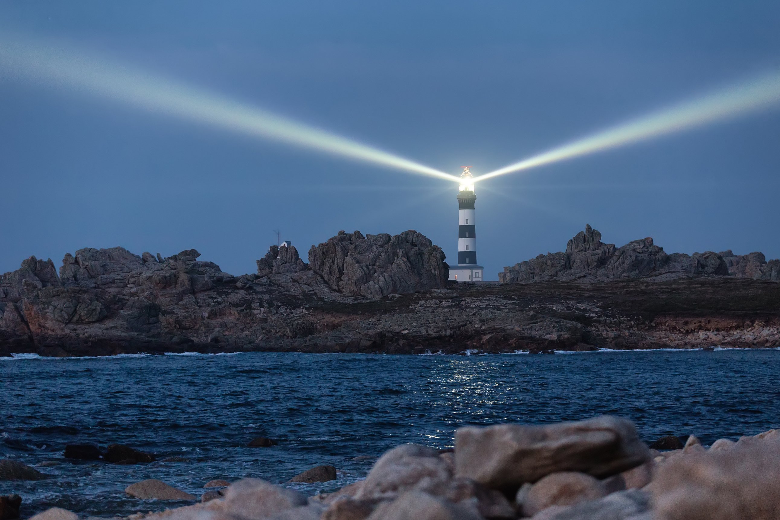 Lighted Lighthouse at Dusk